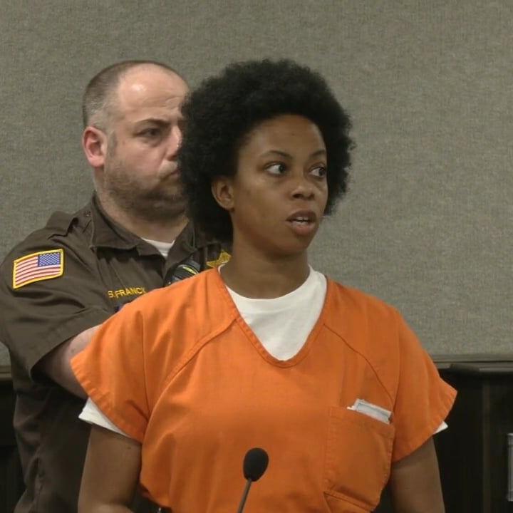 Woman accused of killing her 5-year-old son and putting his body in a suitcase files lawsuit against county clerk